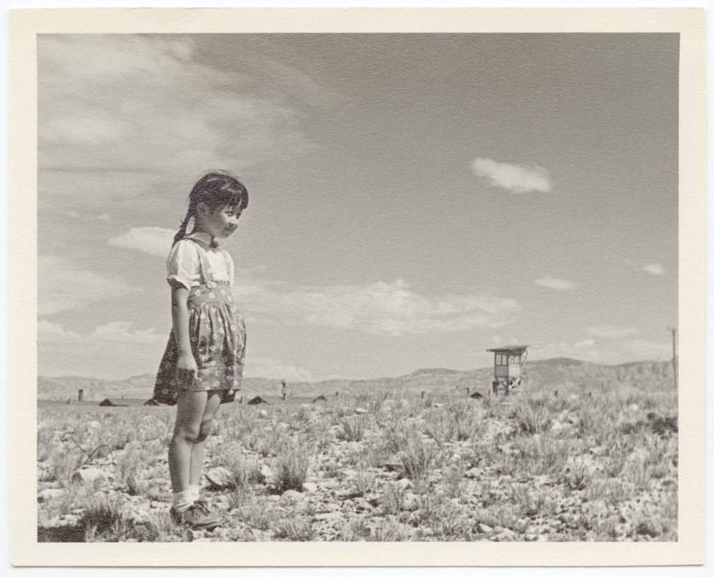 “Young girl near guard tower-Ayaho Inouye.” Heart Mountain Wyoming Foundation. Denshō. Cody, Wyoming
