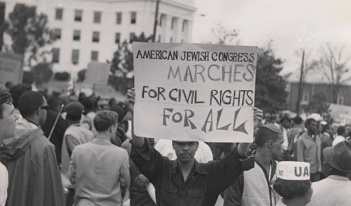 Demonstrator Holding 'American Jewish Congress Marches for Civil Rights for All' Sign. Jewish Museum of Milwaukee